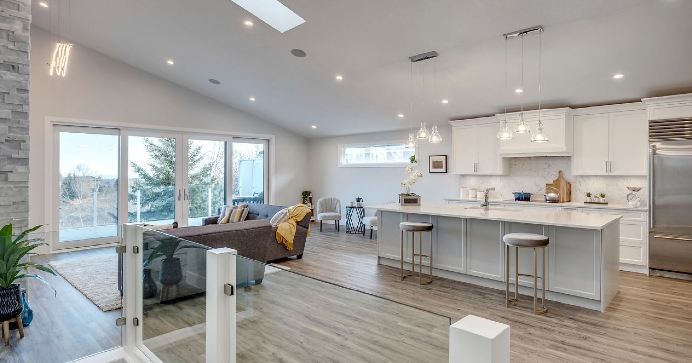 A bright, beautifully renovated open-plan living and kitchen space by Dependable Renovations