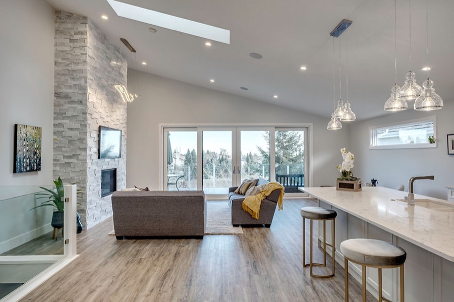 A bright open-plan kitchen and living space renovated by Dependable Renovations